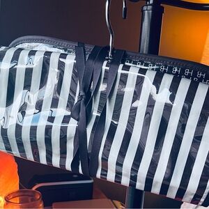 Henri Bendel signature Brown and White Striped Travel Bag
